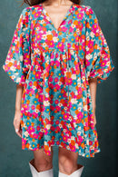 Mini-robe florale à col noué et manches bouffantes