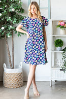 Vestido Heimish de manga corta con volantes florales de tamaño completo y bolsillos