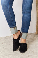 Mules con ribete trenzado y puntera en punta de East Lion Corp