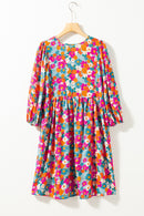 Mini-robe florale à col noué et manches bouffantes