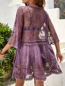 Vestido tipo pareo escotado con detalle de encaje