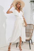 Robe midi nouée à volants et col en V