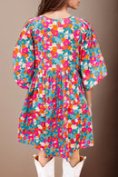 Mini-robe florale à col noué et manches bouffantes