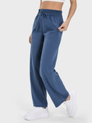 Pantalon actif avec poches à cordon