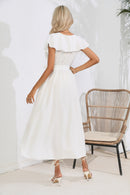 Robe midi nouée à volants et col en V