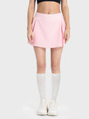 Jupe active à taille mi-haute et détails plissés