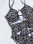 Traje de baño de una pieza anudado con abertura de leopardo