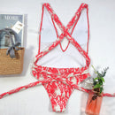 Traje de baño de una pieza con cuello halter y escote en V profundo atado