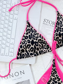 Conjunto de bikini con estampado de leopardo y cuello halter con lazo lateral