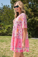 Mini-robe boutonnée à pois et fleurs