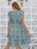 Mini-robe à surplis fleuri et petites fleurs à volants