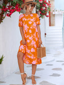 Robe midi fleurie à manches bouffantes et ourlet à volants