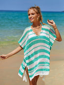 Cover-up con cuello en V y rayas caladas con borlas
