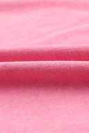 Haut à épaules tombantes et col rond avec poche