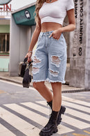 Short en denim vieilli à ourlet brut avec poches
