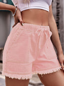 Short en denim à ourlet brut avec cordon de serrage