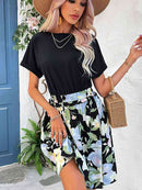 Robe bicolore à col rond et manches à revers