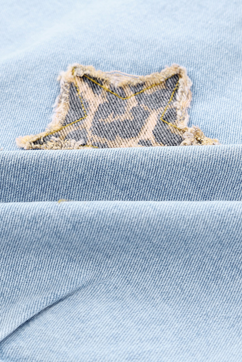 Veste en jean effet vieilli à appliqués d'étoiles léopard