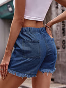 Short en denim à ourlet brut avec cordon de serrage